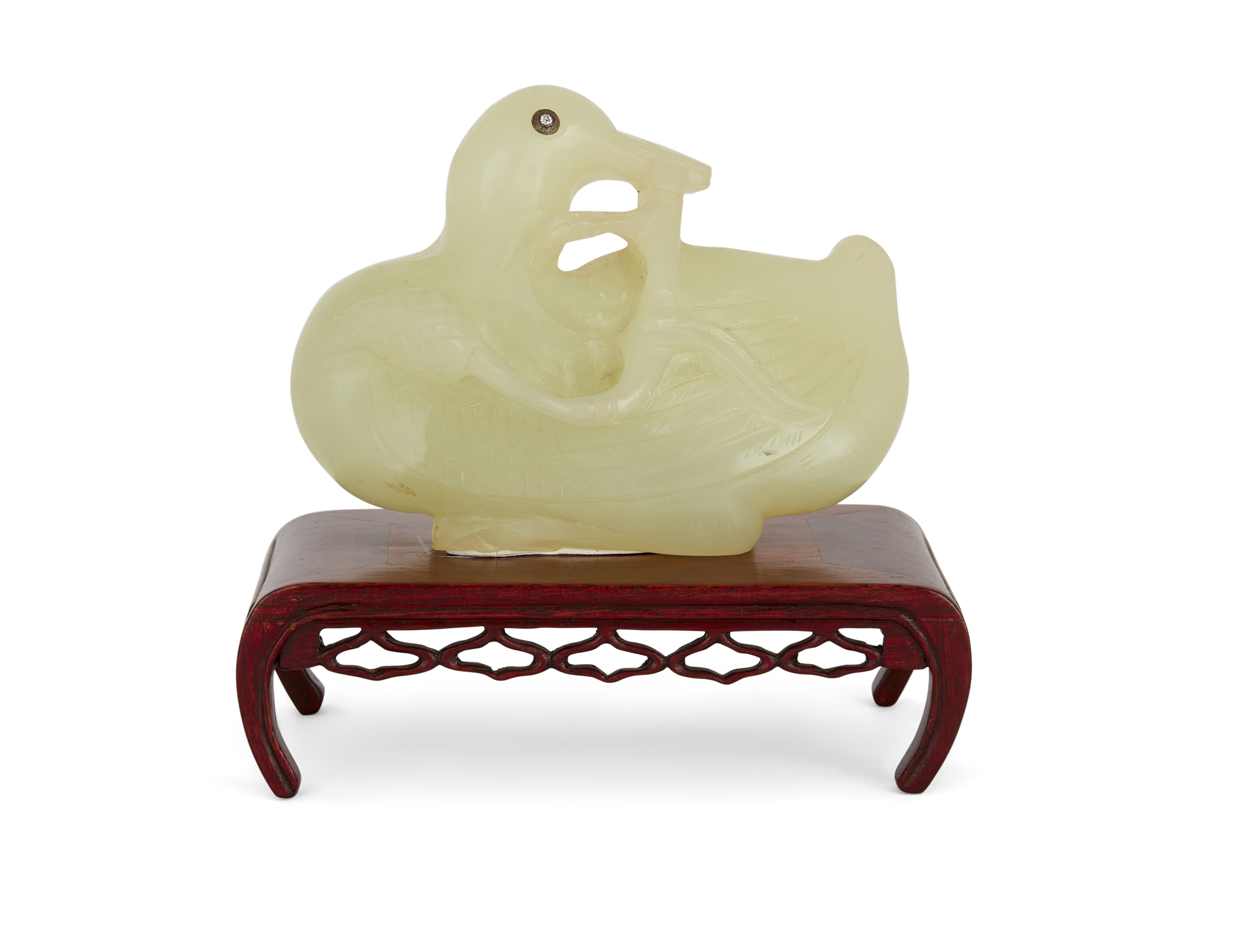 A Chinese Ming style green hardstone figure of a duck with diamond set eyes, 20th century, Carved...