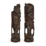 A pair of Chinese hardwood wire inlaid wood carvings, Early 20th century, Carved as immortals wit...