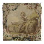 An Aubusson tapestry fragment, Second half 18th century, Woven in wools and silks, depicting a wi...
