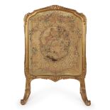 A French giltwood firescreen,  Early 20th century,  Inset with an 18th century Aubusson tapestry ...