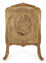 A French giltwood firescreen,  Early 20th century,  Inset with an 18th century Aubusson tapestry ...