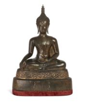 A large Thai bronze figure of Buddha, Late 18th century, Cast seated in dhyanasana, the head with...