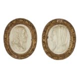 A pair of Italian marble portrait reliefs, Late 17th / early 18th century, Depicting Christ and t...