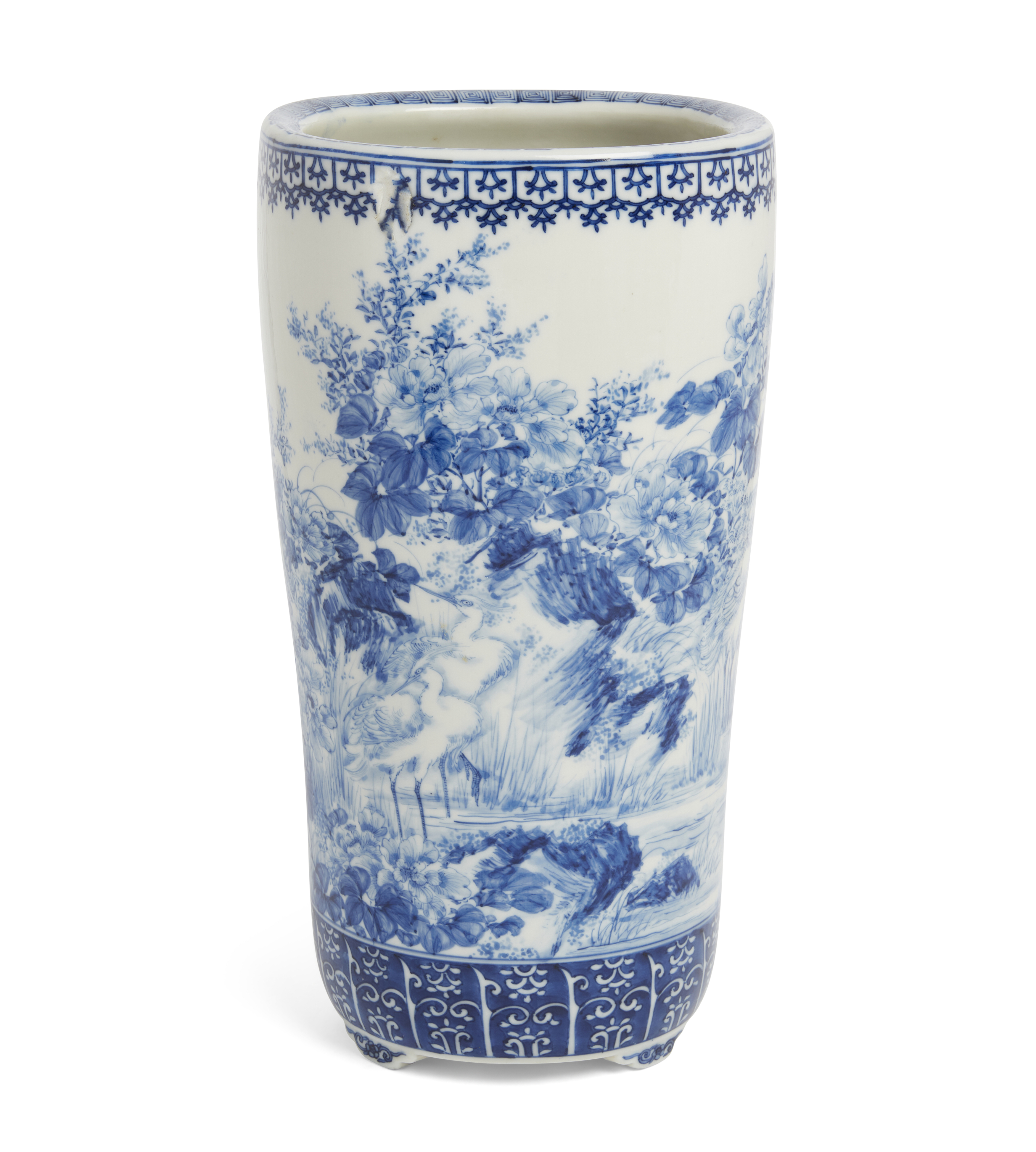 A Japanese blue and white cylindrical vase, Meiji period, early 20th century, Finely painted with...