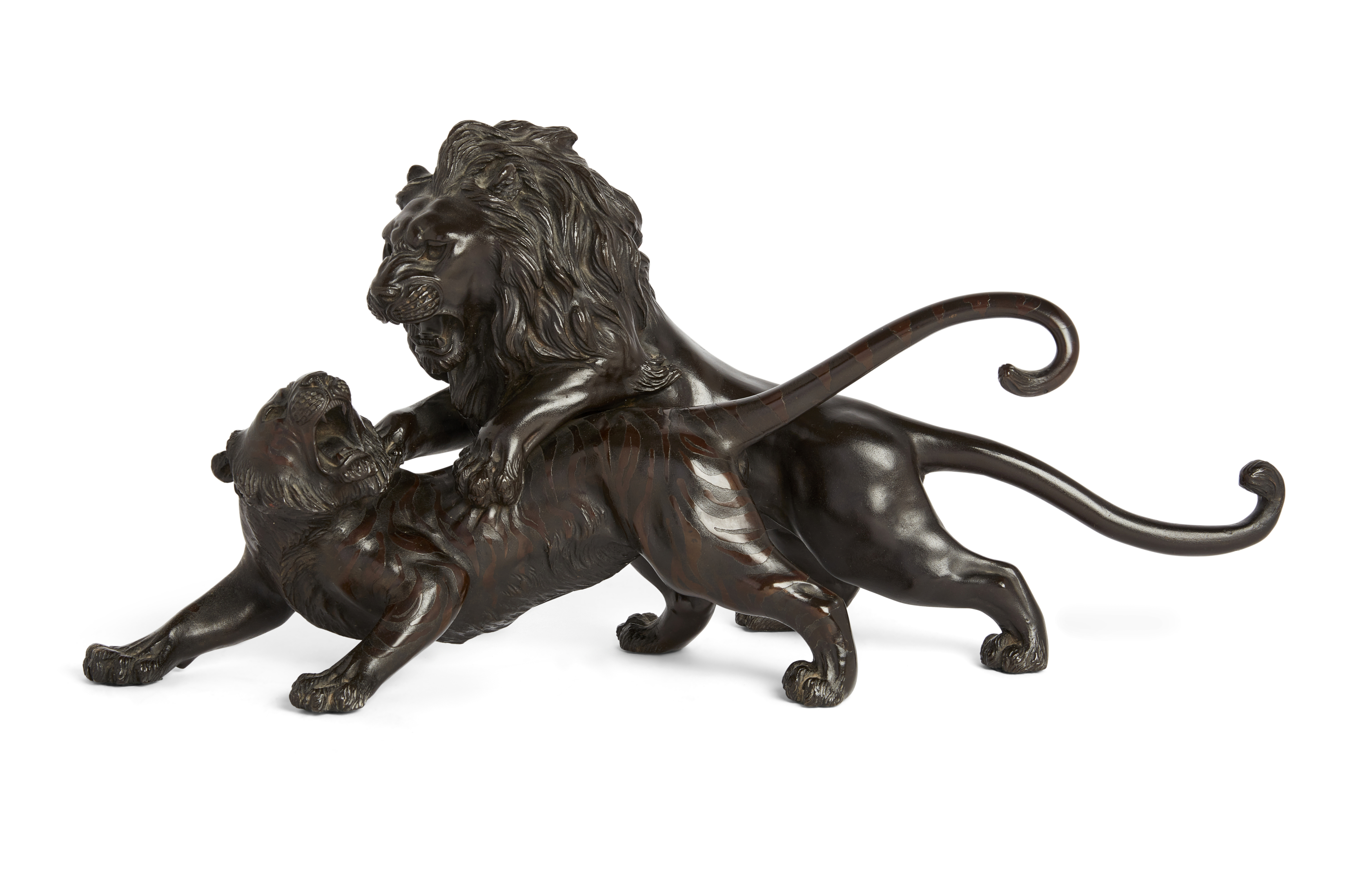 A Japanese bronze okimono of a lion attacking a tiger, By Seikoku, Meiji period, The two powerful...
