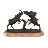 A French bronze Bacchic group, Late 19th century, Depicting a satyr and a goat fighting, on a nat...