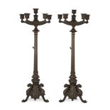 A pair of French bronze six-light candelabra, In the manner of Barbedienne, late 19th century, Ea...