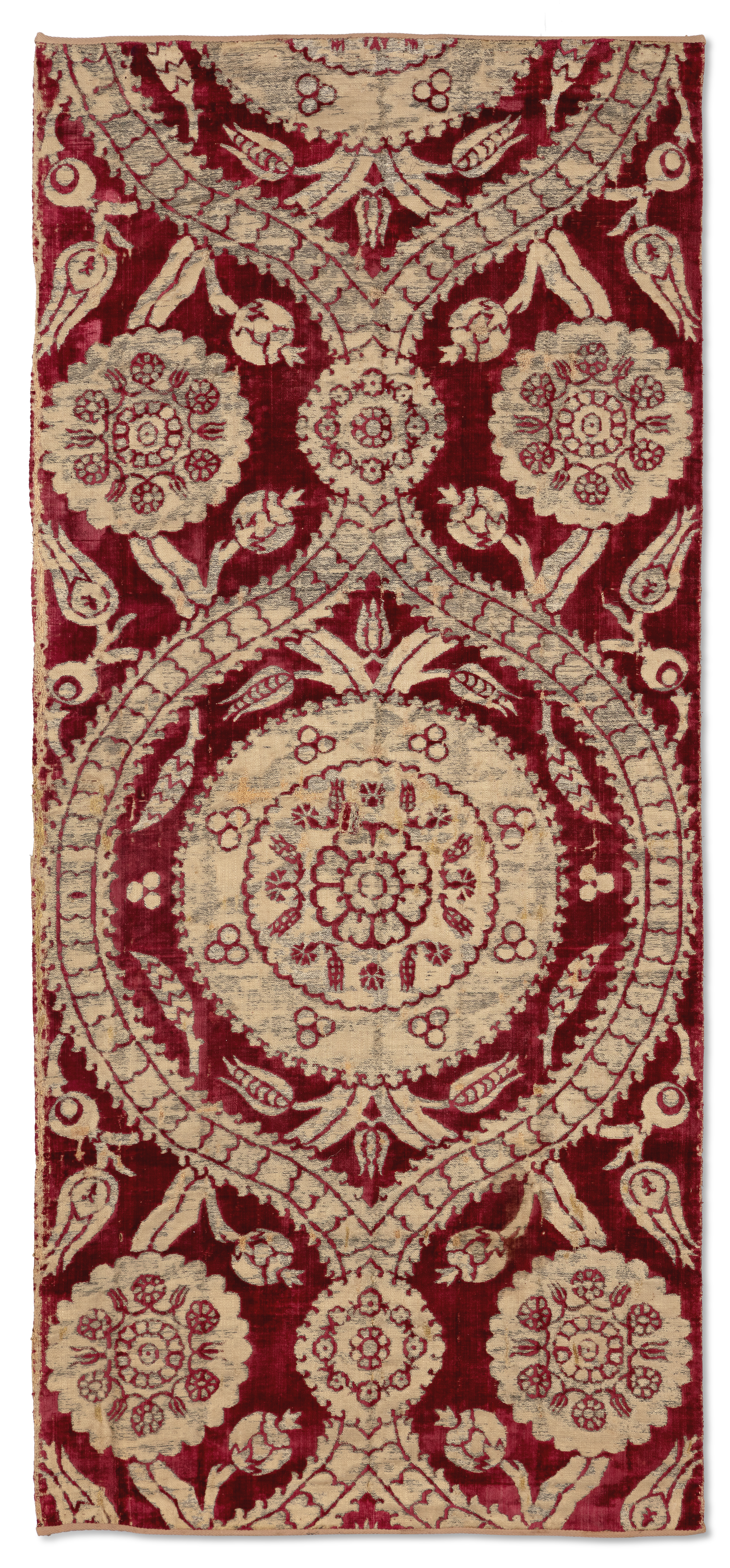 Two voided crimson velvet and silk çatma panels, Ottoman Bursa or Istanbul, 17th century, Each wo...