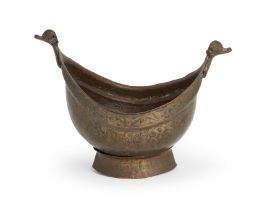 An engraved copper or copper-alloy begging bowl (kashkul),   Iran, 19th century, Of typical form,...