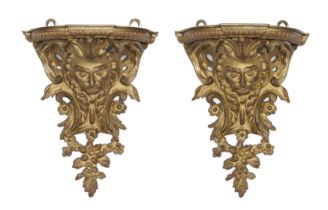 A pair of French gilt-bronze wall brackets, Of Regence style, 19th century, Each with associated ...