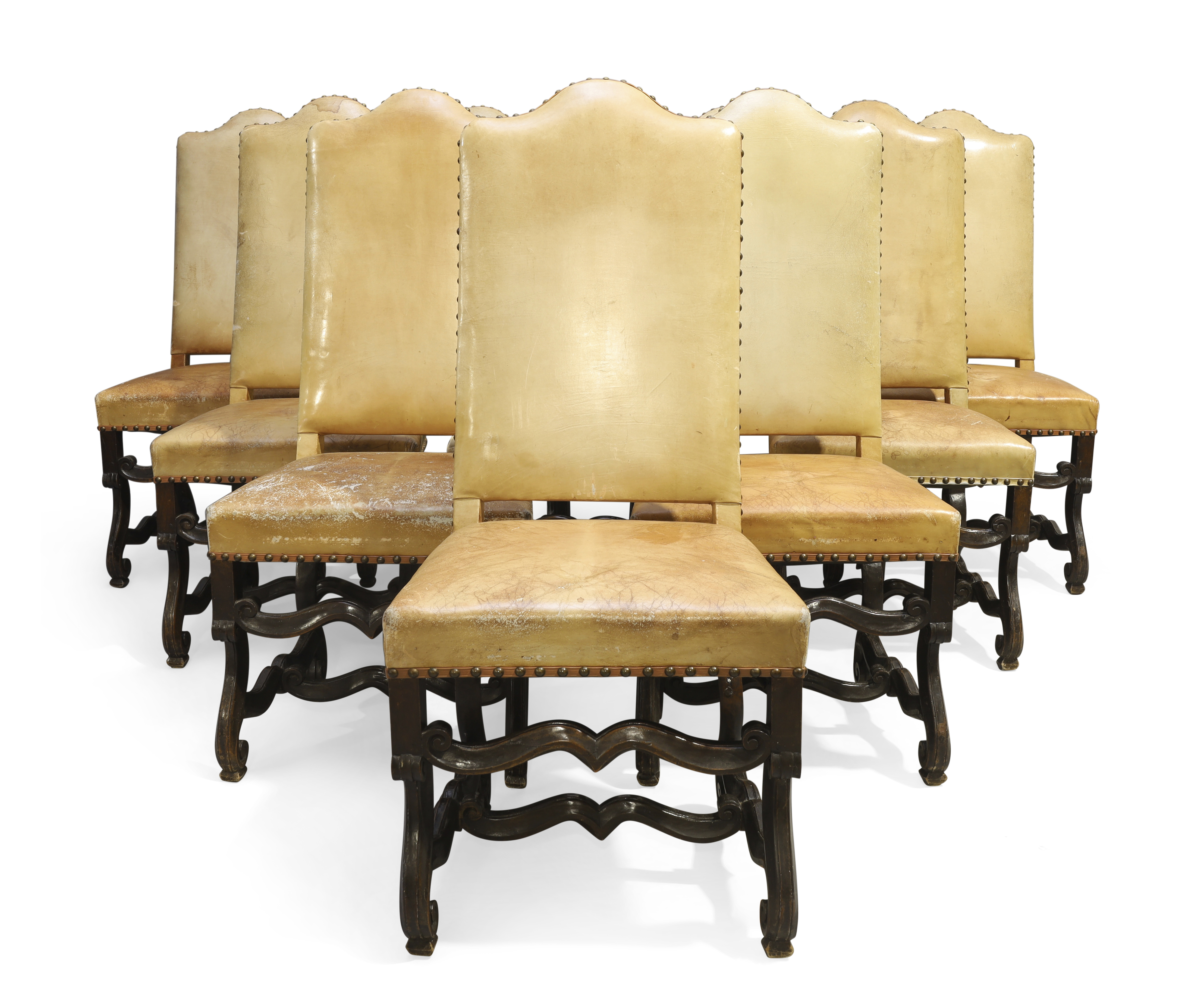 A set of ten French walnut dining chairs, 17th century, With stuffover backs and seats, later lea...