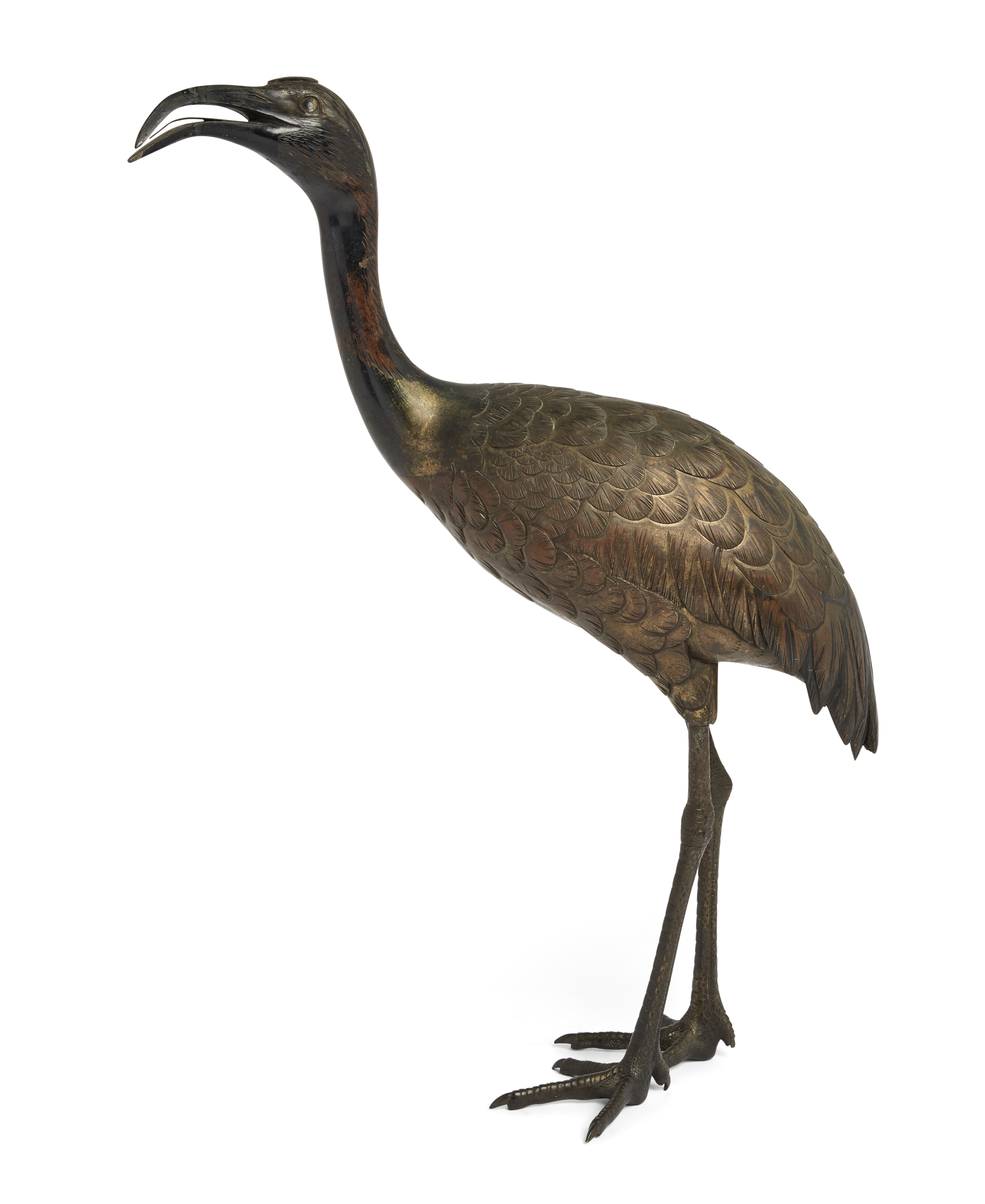 A Japanese bronze figure of a crane, Meiji period, The plumage with traces of gilt, 47cm high