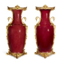 A pair of large Chinese copper red glazed baluster vases, Qing dynasty, late 18th century, With e...