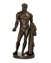 A bronze model of Hercules, French or Italian, first half 19th century, Depicted nude holding a c...