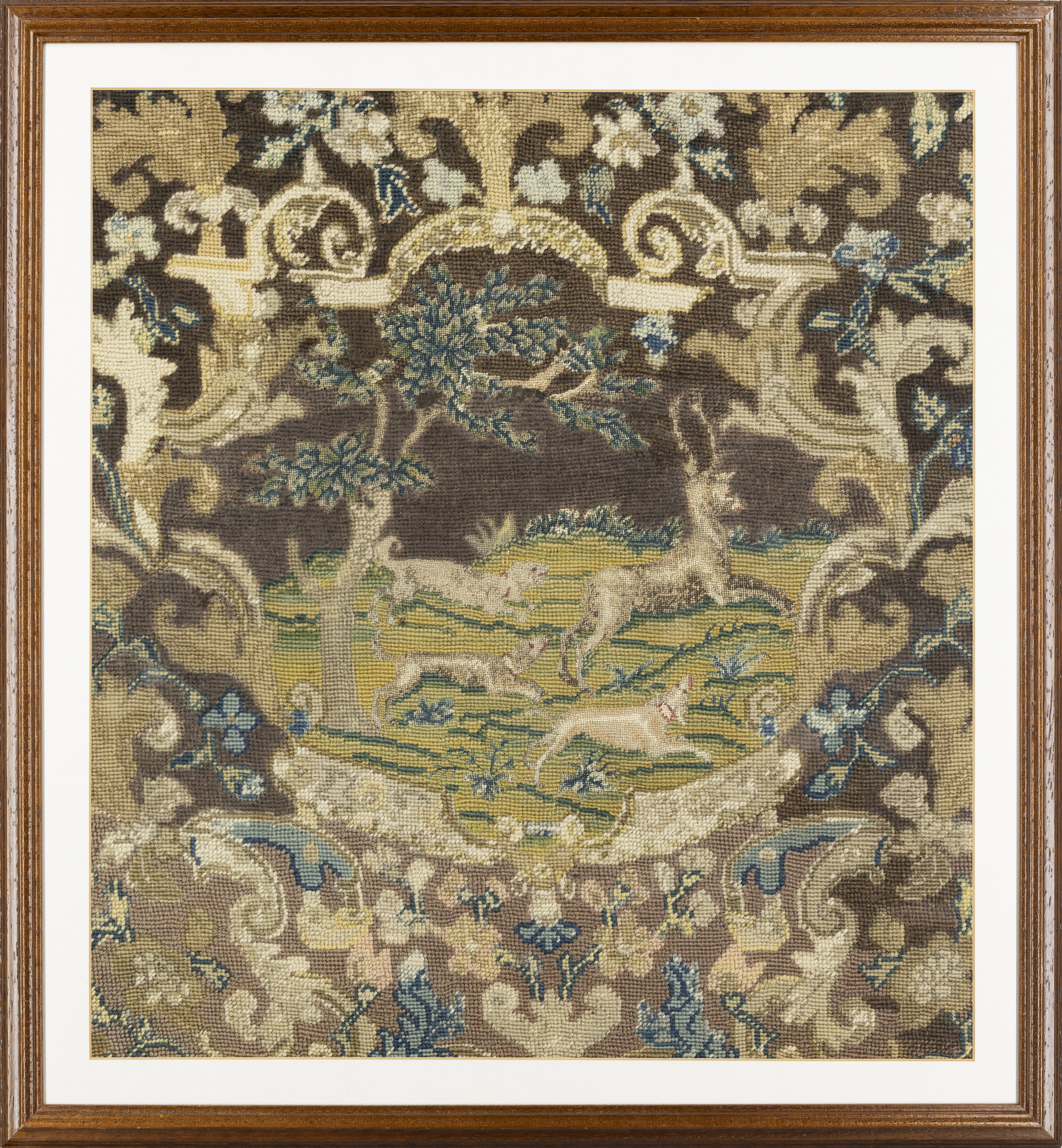 A Continental needlework fragment, 18th century and later, Depicting a stag being pursued by thre... - Image 2 of 2