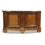 A French walnut bow front credenza, Last quarter 19th century, With veined marble top above two d...