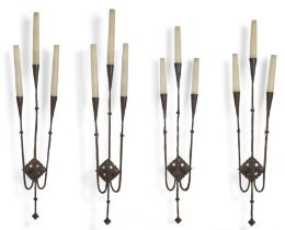 A set of four wrought iron three-light wall appliques, Made to order for George Farrow, second ha...