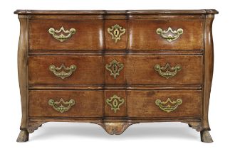 A provincial Louis XV mahogany commode, Second quarter 18th century, With three long drawers, on ...