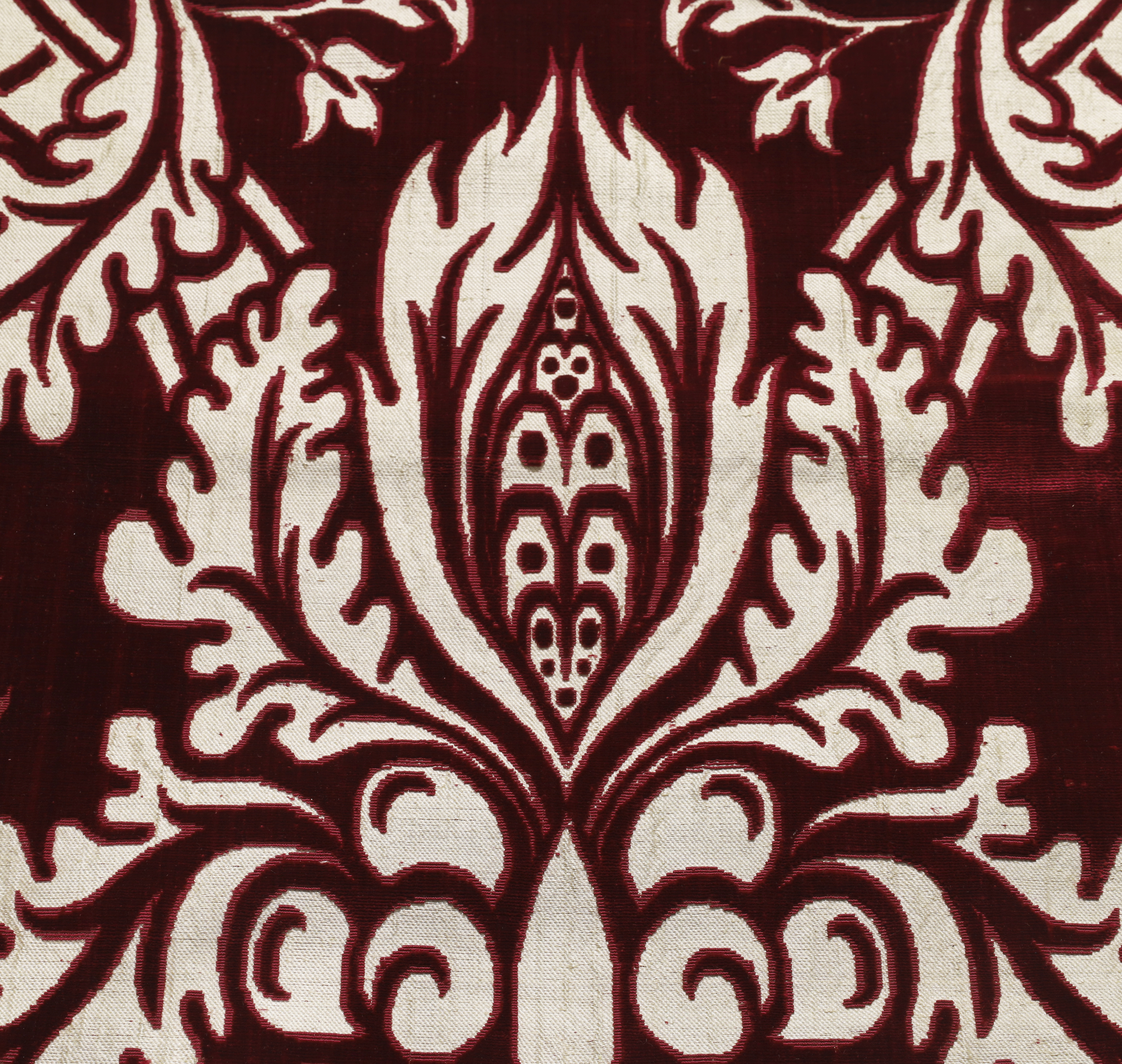 A cut velvet panel, Late 19th century,  With an ogival lattice voided to ivory silk, later backed... - Image 2 of 4