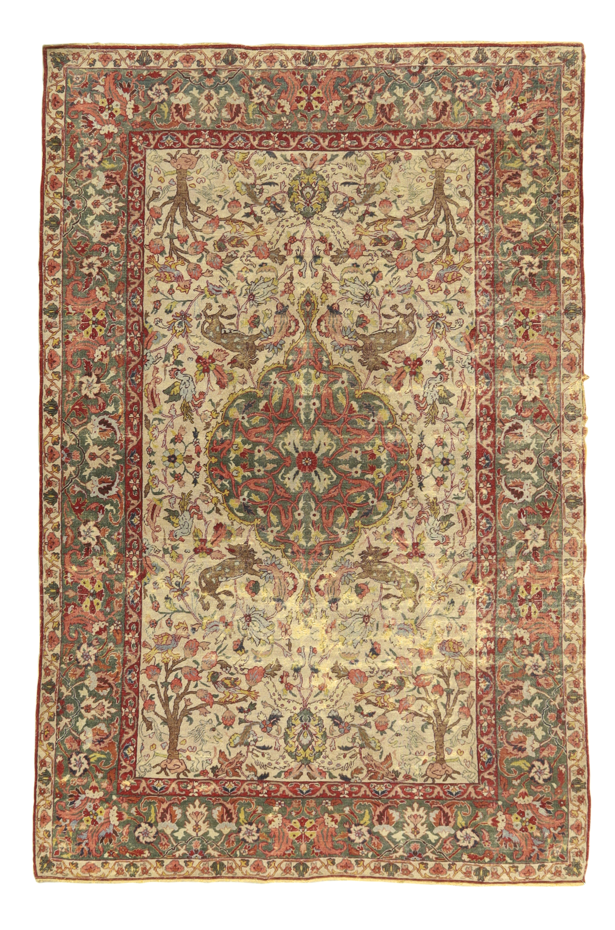 A Turkish rug,  Last quarter 19th century,  The central field with tree and zoomorphic motifs, on...