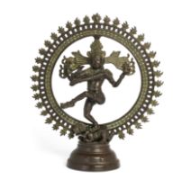 A copper alloy figure of Shiva Nataraja, India, 20th century, Performing tandava while trampling ...