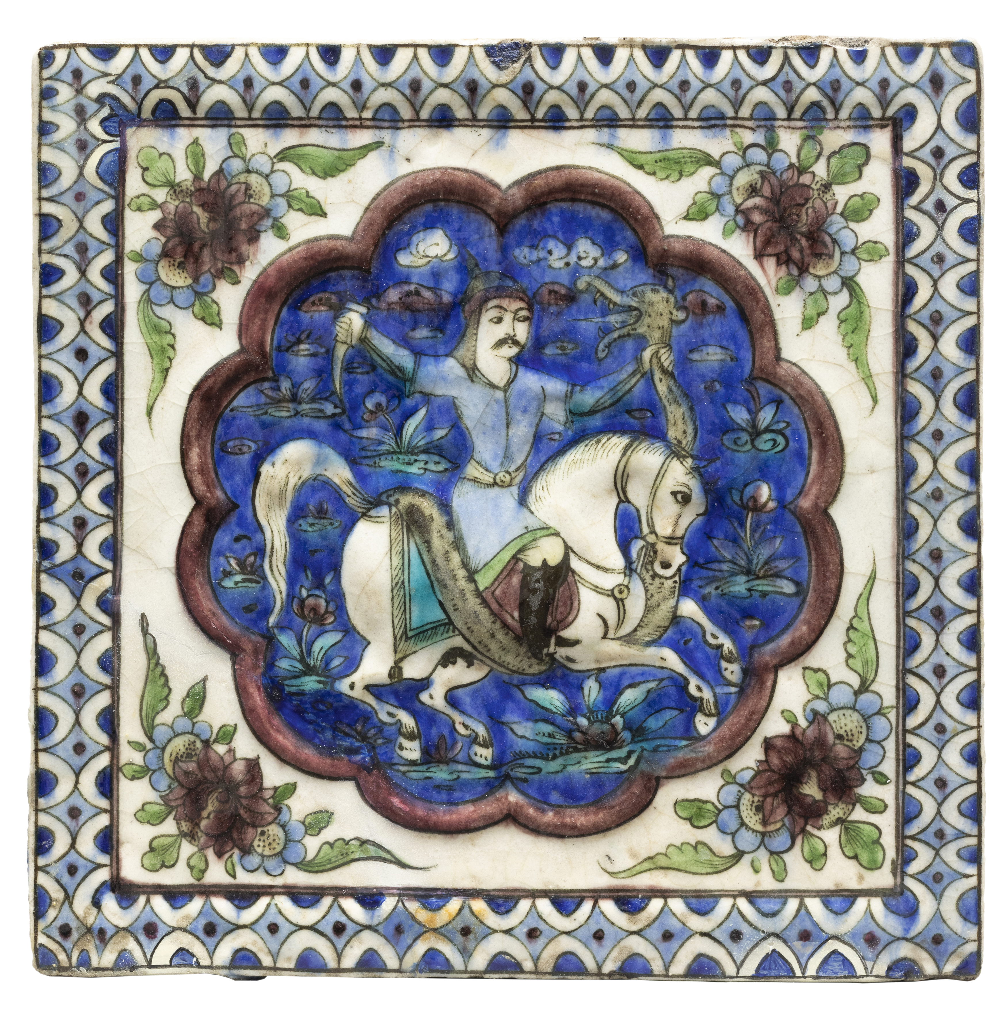 A moulded and figural pottery tile,  Qajar Iran, late 19th / early 20th century, Perhaps Rustam o...