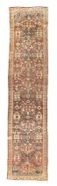 A Persian Mahal runner, Second quarter 20th century,   The central field with stylised floral mot...