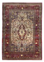 A Persian silk Kashan rug, First quarter 20th century,  The central field with floral medallion s...