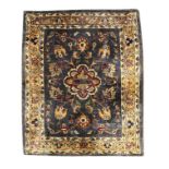 A Persian silk mat, Signed, third quarter 20th century,  The central field with floral medallion,...