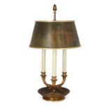 A French gilt-bronze bouillotte lamp, Early 20th century, With three branches, acorn finial and a...