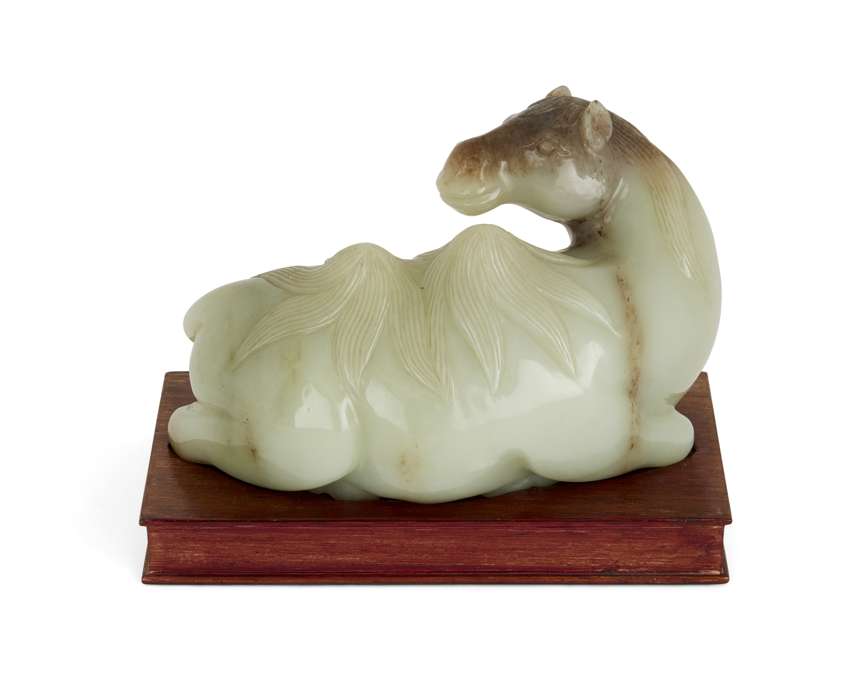 A Chinese Ming style celadon jade figure of a recumbent camel, 20th century, Carved with its head... - Image 2 of 2