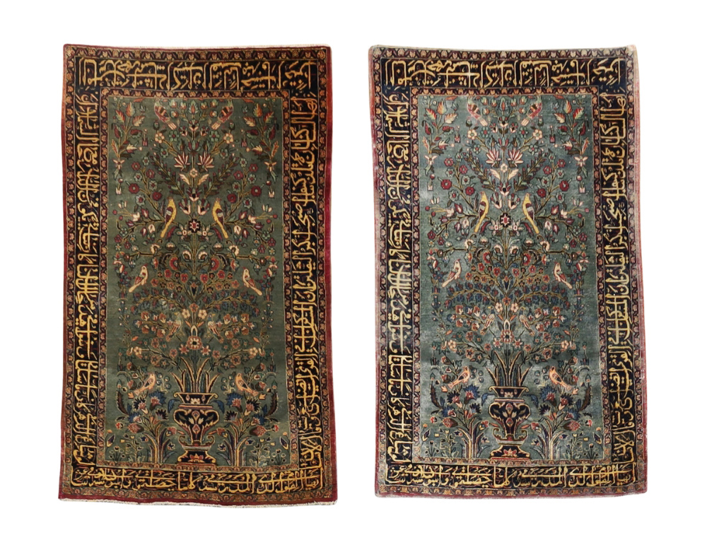 A pair of Persian silk Kashan rugs, Last quarter 19th century, The central field with a vase of f...