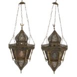 A pair of hexagonal metal and glass hanging lamps,   20th century, Tiered, with openwork domes an...