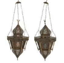 A pair of hexagonal metal and glass hanging lamps,   20th century, Tiered, with openwork domes an...