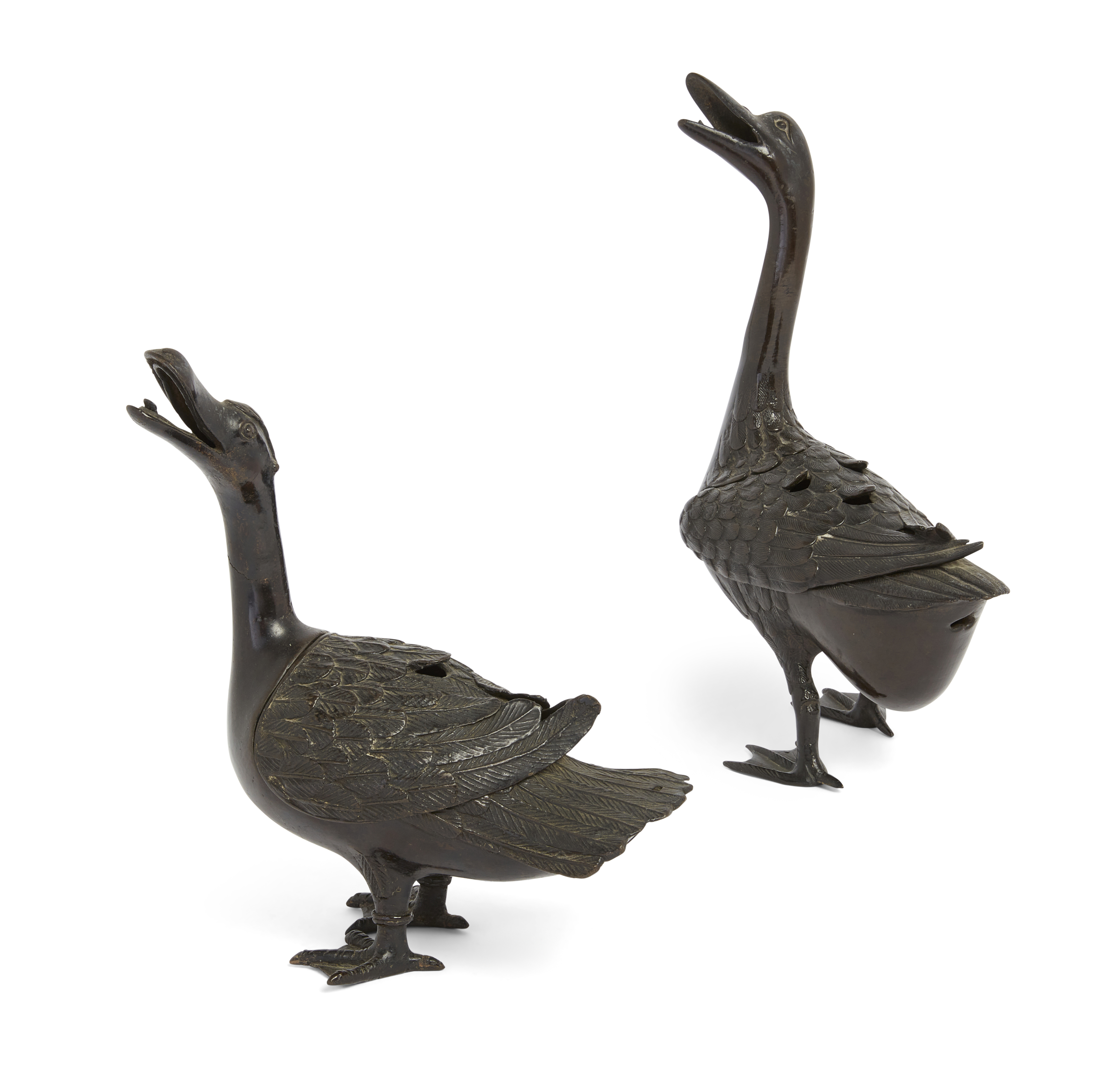 Two Chinese bronze duck form censers, Ming dynasty, 17th century, Each with neck raised and mouth...