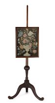 An English mahogany pole screen with needlework panel, 18th century and later, The adjustable rec...