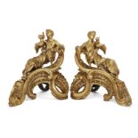 A pair of French ormolu chenets, After a model by Charles Cressent, French, 1685-1768, 19th centu...