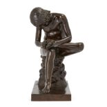 A French bronze model of Spinario, After the Antique, third quarter 19th century, Shown seated re...