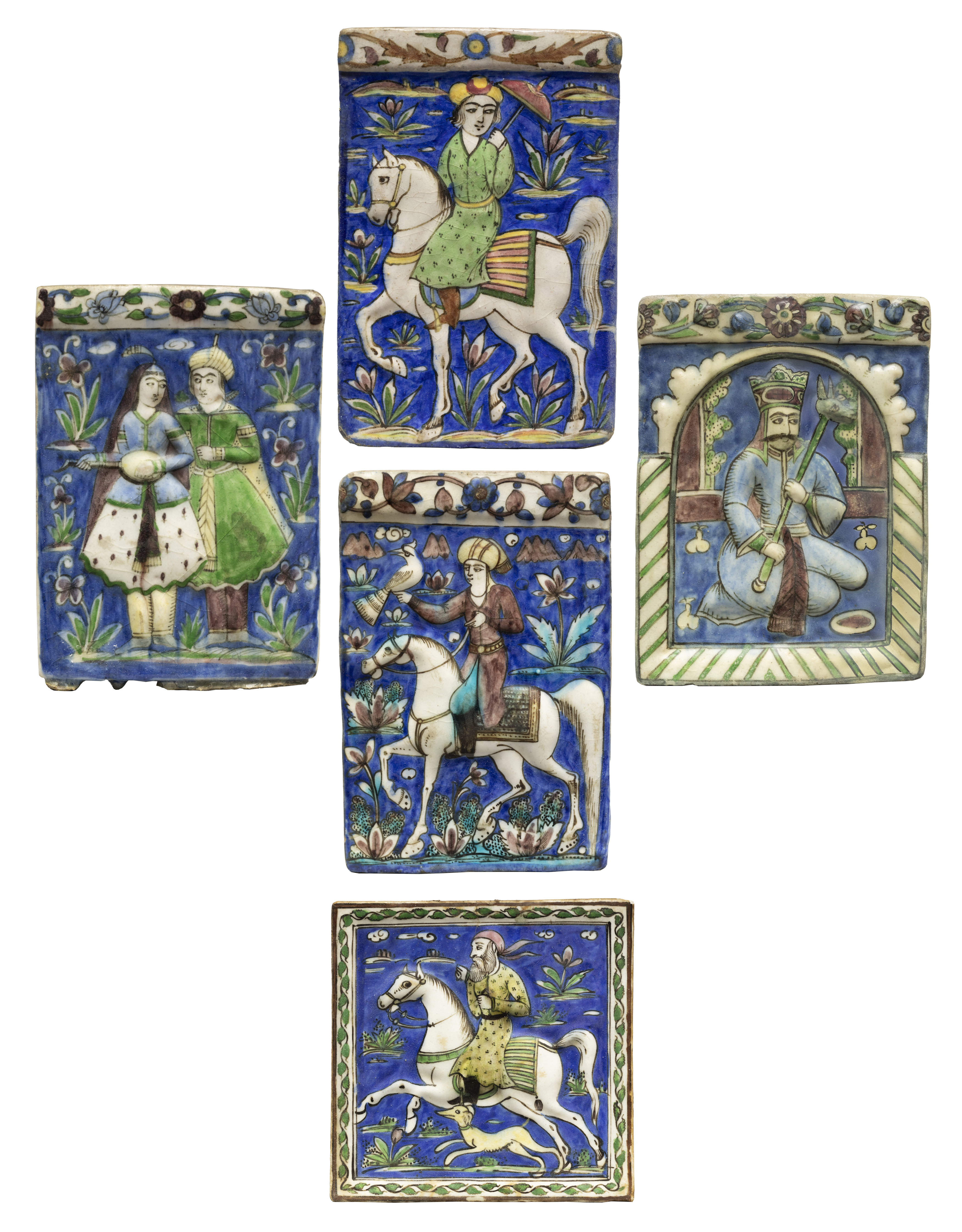 Five figural, polychrome moulded pottery tiles, Qajar Iran, c.1890, The first of rectangular form...
