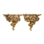 A near pair of French gilt-bronze wall brackets, Of Louis XV style, 19th century, Each with a pro...
