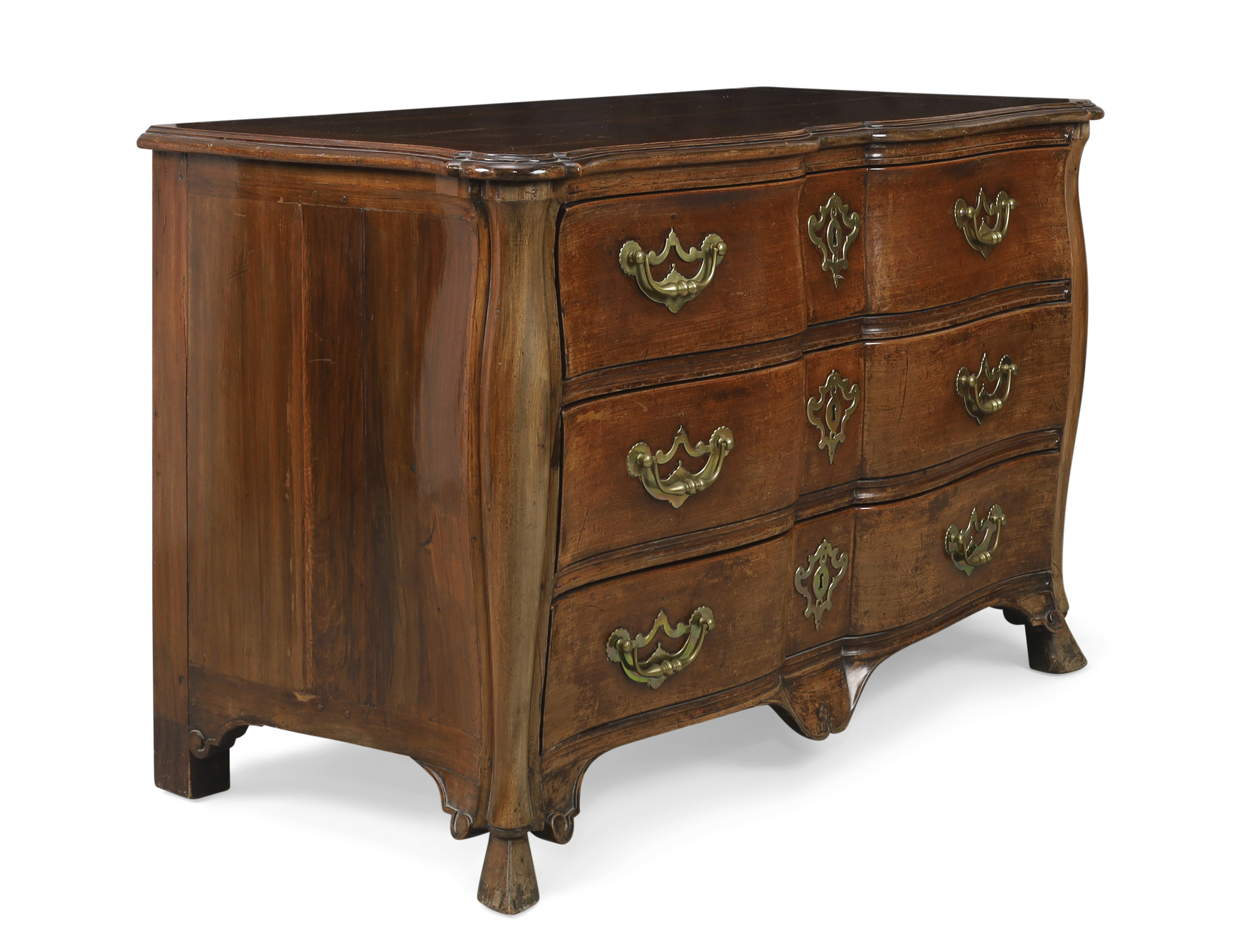 A provincial Louis XV mahogany commode, Second quarter 18th century, With three long drawers, on ... - Image 2 of 4