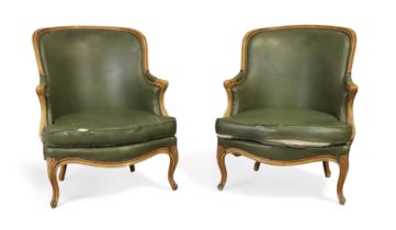 A pair of provincial French beech bergeres, Of Louis XV style, first quarter 20th century, With g...