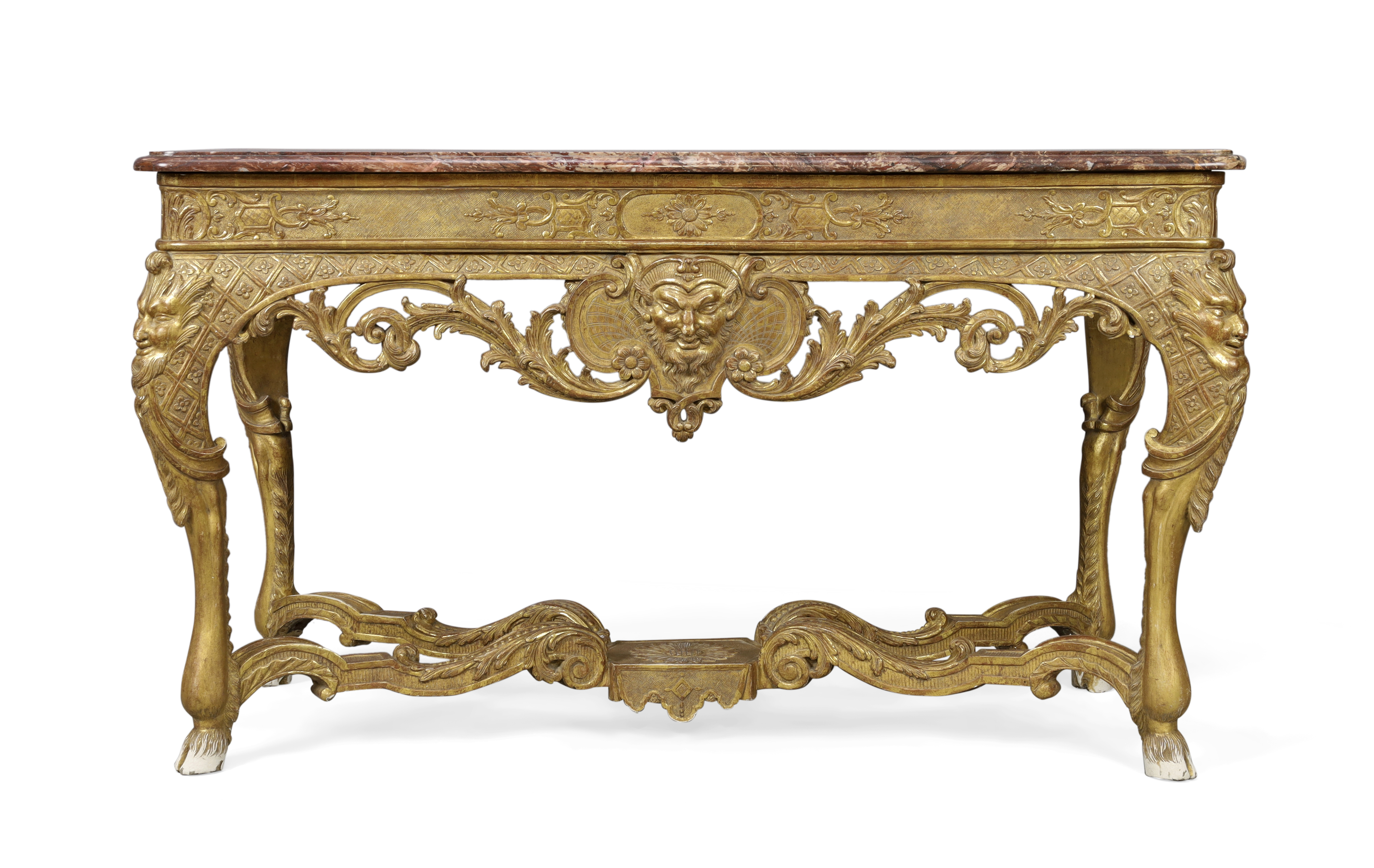 A Regence giltwood console table, First quarter 18th century, The marble top above carved frieze ...