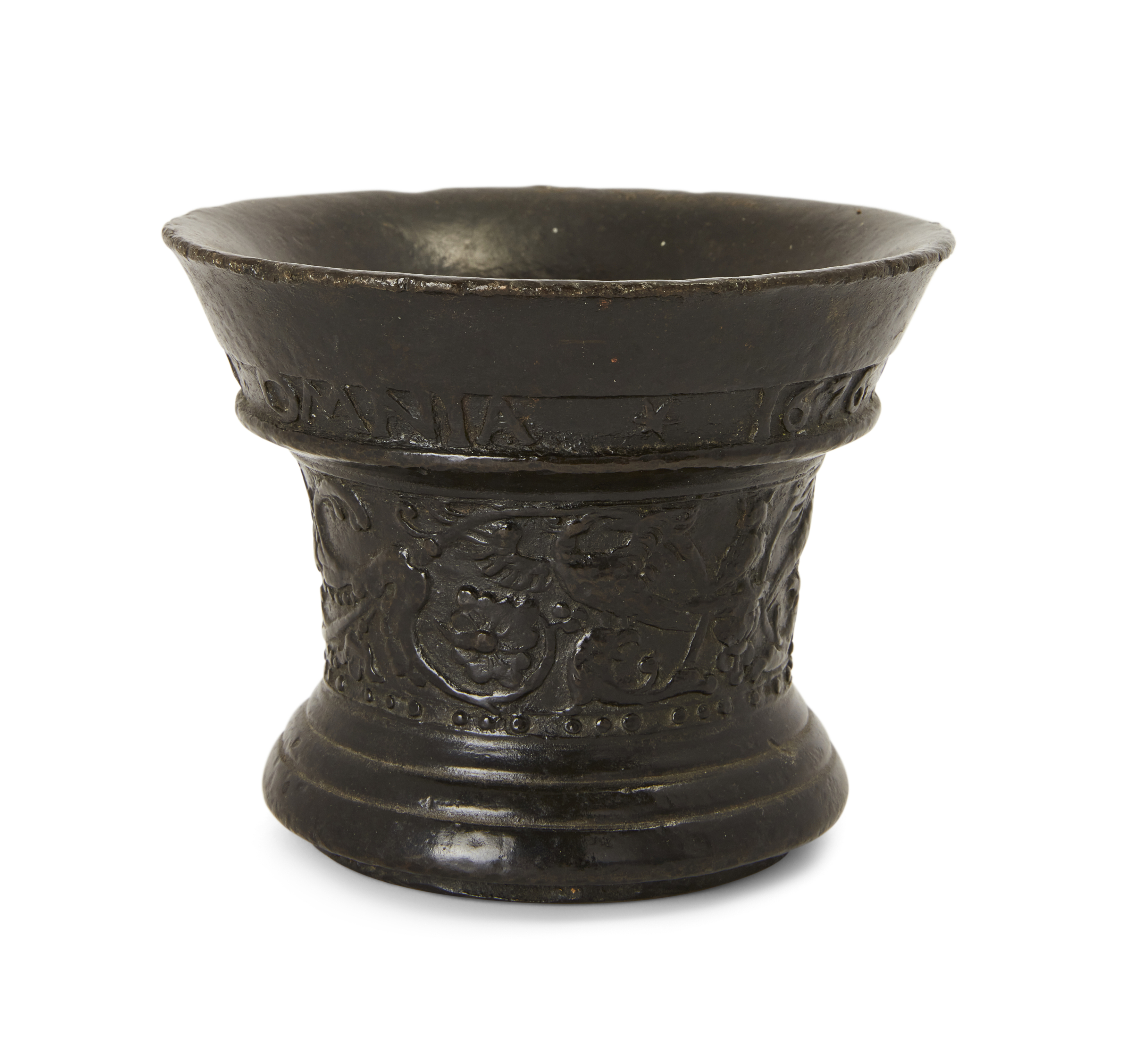 A Dutch bronze mortar, Dated 1676, Cast with exotic birds amid scrolling foliage, the rim inscrib...