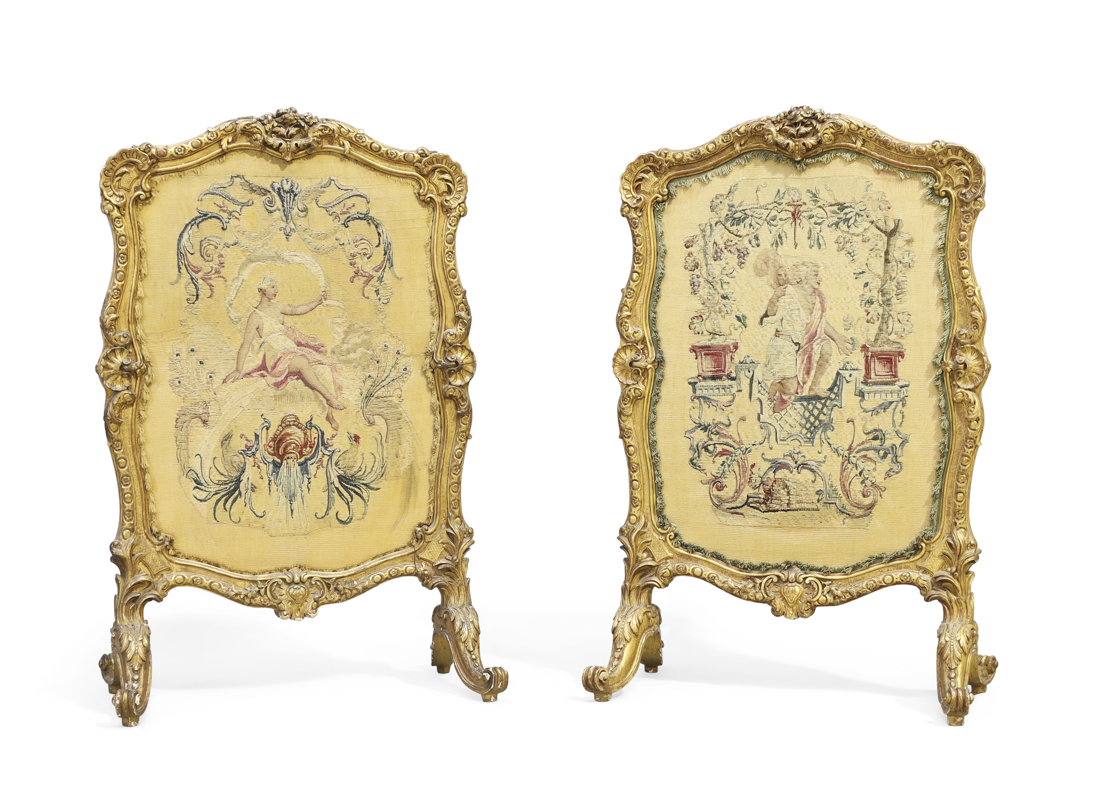 A pair of French giltwood firescreens, Late 19th century, Inset with 18th century Aubusson allego...