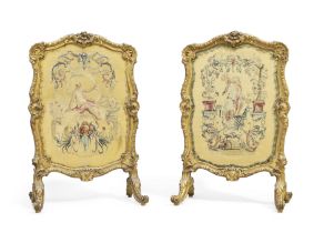 A pair of French giltwood firescreens, Late 19th century, Inset with 18th century Aubusson allego...