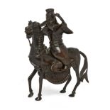 A Chinese bronze Ming style incense burner, Qing dynasty, 19th century, Cast as a warrior on hors...