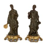 A pair of French bronze Chinoiserie figures, Mid-19th century, The male and female figures each s...