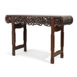 A Chinese rosewood scroll table, Qing dynasty, Daoguang period, The rectangular top above reticul...