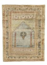 A Persian silk Tabriz prayer rug, Last quarter 19th century,  The mihrab field with central wreat...